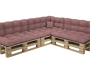 Corner sofa with pallets and quilted pillows
