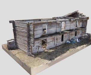 two-story wooden barn