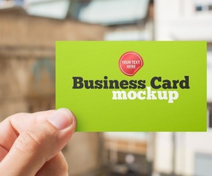 Focused Business Card in Hand Mockup PSD Template