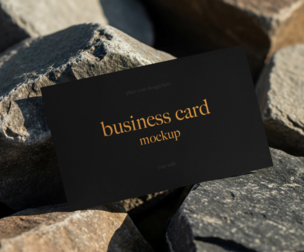 Luxury Black Business Card Mockup PSD Template on Rough Stone