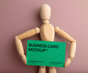 Business Card Mockup PSD Template Held by Wooden Mannequin