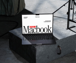 MacBook Pro Mockup PSD Template on Concrete Surface