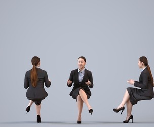 00038_Esmee004 Adult Asian woman talking in office wearing autumn or spring business attire