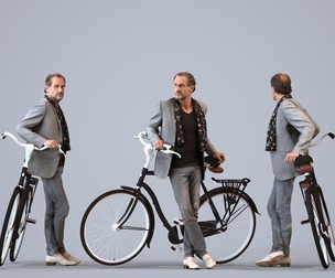 00050_PaulJan012 Adult Caucasian man waiting with bicycle in transitional seasonal business attire