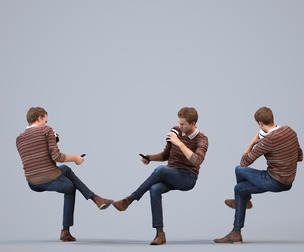 00058_Jeffrey008 Adult Caucasian man sitting at home using smartphone in transitional attire