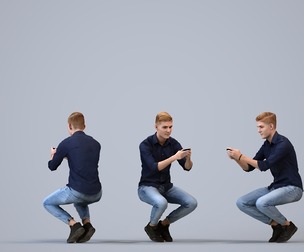 00083_Ewoud014 Adult Caucasian man crouching outdoors with smartphone in autumn attire