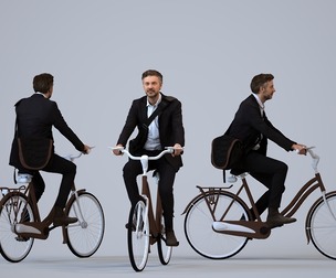 00104_Floris009 Adult Caucasian man cycling through public space in transitional business attire