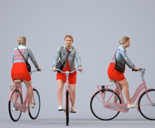 00125_Kiera012 Adult Caucasian woman cycling through public space in transitional seasonal clothing