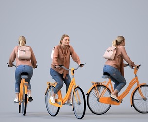 00128_Kiera015 Adult Caucasian woman cycling through public space in transitional seasonal attire