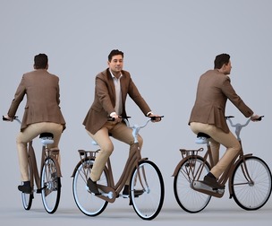 00142_Connor013 Adult Caucasian man cycling through public space in transitional business attire