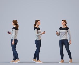 00168_Vale004 Adult Caucasian woman walking outdoors with smartphone in transitional seasonal