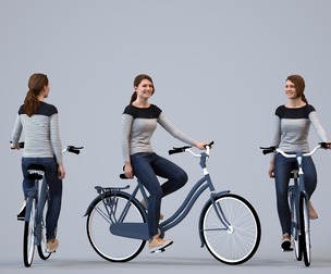 00168_Vale001 Adult Caucasian woman cycling through public space in transitional seasonal clothing
