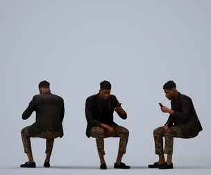 00173_Raymond009 Adult Black male sitting with smartphone in transitional seasonal clothing