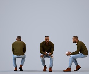 00176_Terrell005 Adult Black male sitting comfortably at home in transitional seasonal clothing