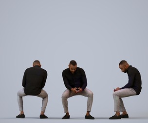 00178_Terrell007 Adult Black male sitting in office with smartphone, autumn or spring attire