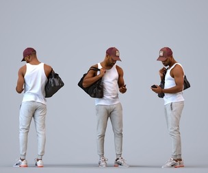 00182_Terrell004 Adult Black male standing in public space with bag and smartphone