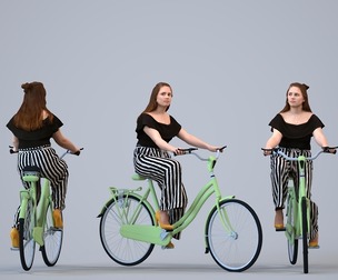 00196_Louise001 Adult Caucasian woman cycling through public space in casual summer attire