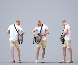 00204_Lucian007 Adult Caucasian man waiting with travel bag in casual summer attire