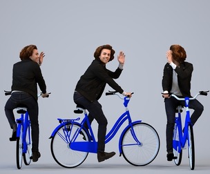 00210_Quint0015 Adult Caucasian man cycling in public wearing transitional seasonal clothing