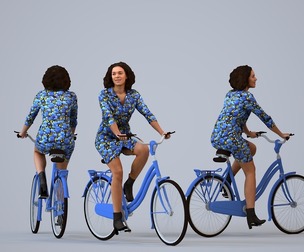 00213_Aimee0001 Adult Black woman cycling in casual transitional seasonal clothing for urban