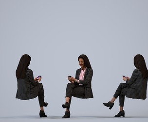 00228_Yawan0013 Adult Indian woman sitting in office wearing business attire holding smartphone