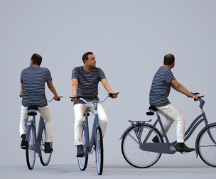 00240_Zeef0011 Adult Indian man cycling through public space in casual summer attire