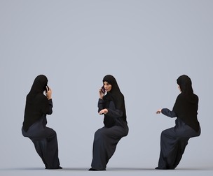 00243_Hannah0007 Adult Middle Eastern woman sitting in office, calling on smartphone wearing abaya