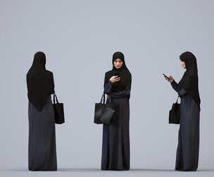 00243_Hannah0005 Adult Middle Eastern woman standing in public wearing abaya and hijab for