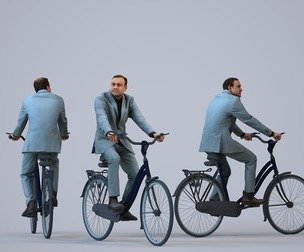 00246_Zeef0009 Adult Indian man cycling through public space in transitional business attire