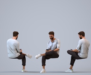 00274_Olivier009 Adult Caucasian man sitting at home using smartphone in transitional attire