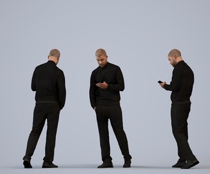 00281_Bill0007 Adult Black male walking outdoors with smartphone in transitional seasonal clothing