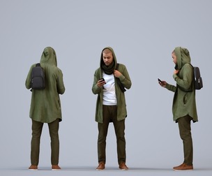 00285_Bill0008 Adult Black male standing in public space with smartphone and bag, winter attire