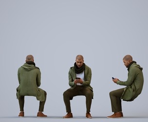 00285_Bill0014 Adult Black male sitting in public space with smartphone, winter clothing