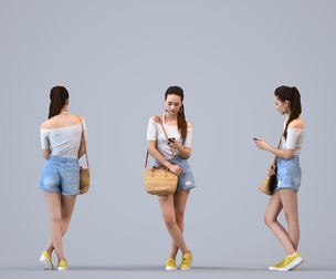 00302_Hideki011 Adult Caucasian woman standing in public space with smartphone and bag