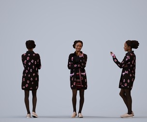 00309_Carolina006 Adult Black woman standing at home with smartphone in transitional seasonal