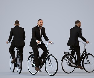 00311_Adil001 Adult Caucasian man cycling through public space in business attire