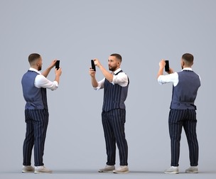 00313_Adil005 Adult Middle Eastern man photographing in office wearing transitional seasonal