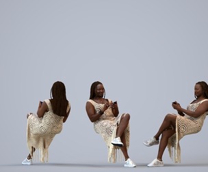 00314_Theresial016 Adult Black woman sitting at home with smartphone in casual summer attire