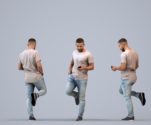 00315_Adil005 Adult Middle Eastern man standing with smartphone in casual summer sportswear