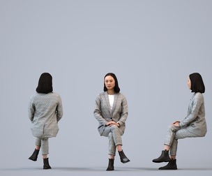 00325_Xia006 Adult Asian woman waiting in office wearing transitional seasonal business attire