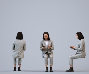 00325_Xia009 Adult Asian woman sitting in office using smartphone, autumn spring attire