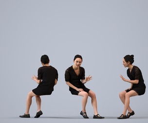 00329_Xia006 Adult Asian woman sitting and talking in office wearing transitional seasonal business