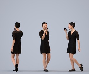 00329_Xia005 Adult Asian woman walking publicly in business attire holding smartphone