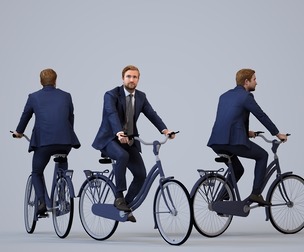 00332_Foster014 Adult Caucasian businessman cycling in public space wearing transitional seasonal