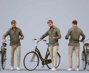 00334_Foster011 Adult Caucasian man waiting with bicycle wearing casual transitional seasonal