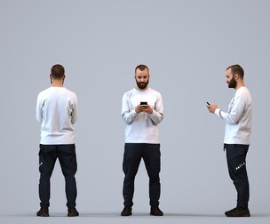 00341_Mansur005 Adult Middle Eastern man standing outdoors with smartphone in transitional seasonal
