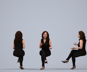 00342_Anisa008 Adult Caucasian woman talking while seated in modern office space