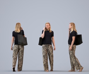 00355_Sophie005 Adult Caucasian woman walking outdoors calling with smartphone and bag