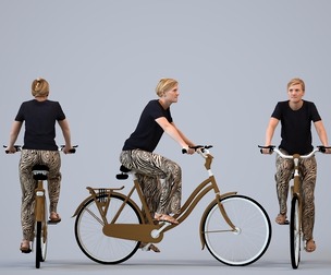 00355_Sophie021 Adult Caucasian woman cycling through public space in casual summer attire