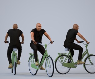 00356_Carl012 Adult Black man cycling through public space in transitional seasonal clothing